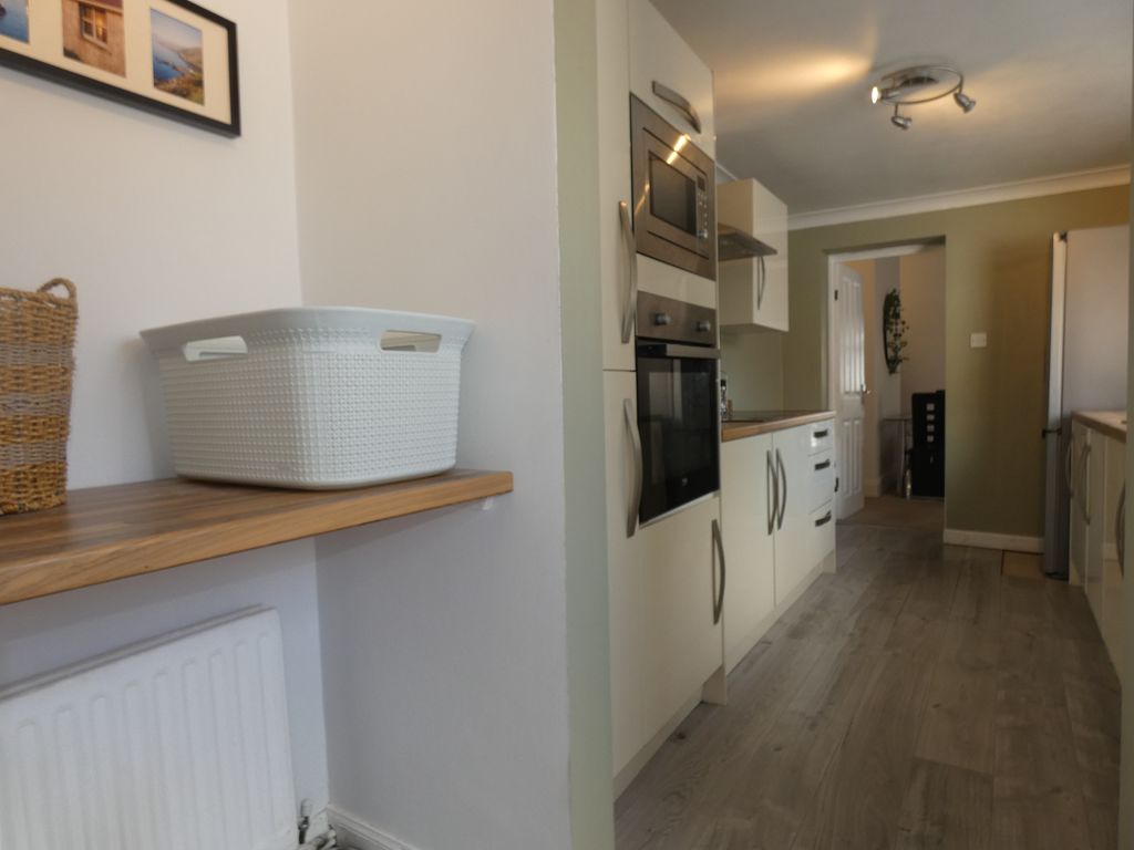 Rear Lobby into Kitchen- click for photo gallery